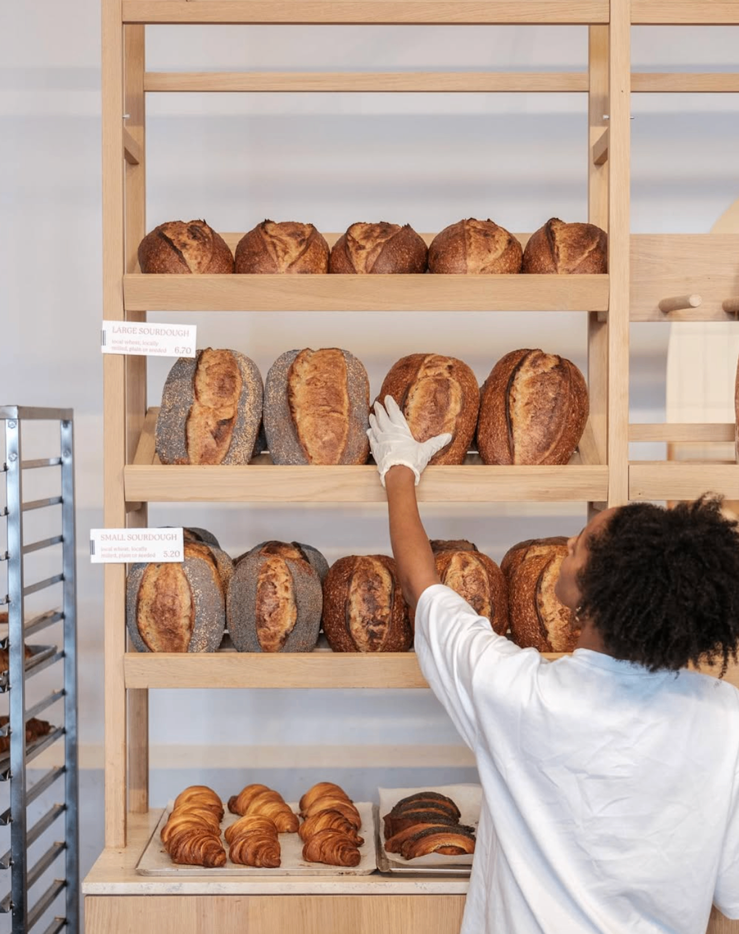 Sourdough loaves on bakery shelves at Bartine